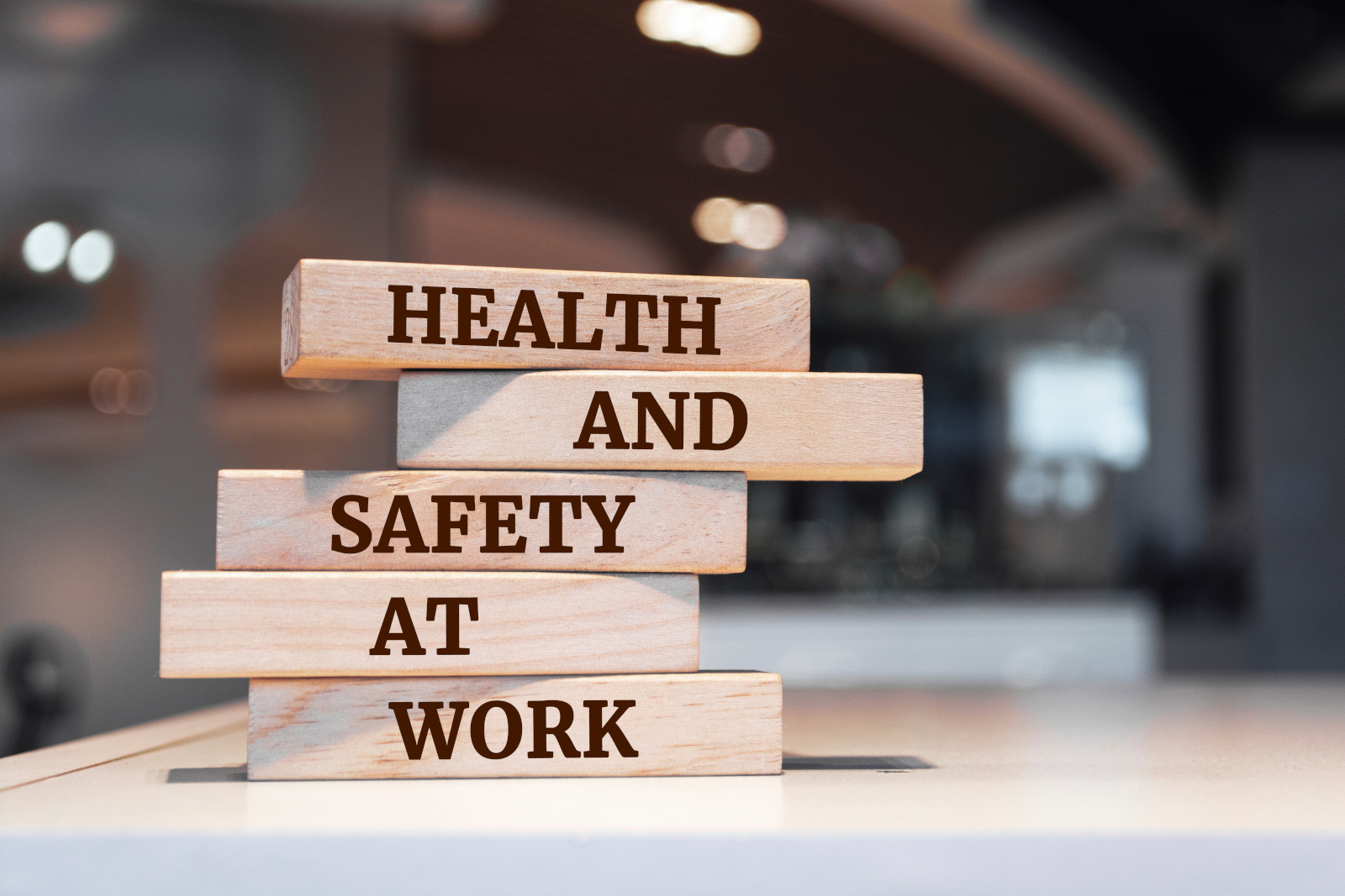 Wooden blocks saying ‘Health and Safety Audits at Work’, using the  NestForms mobile form app