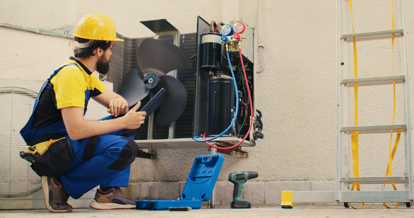 Technician inspecting HVAC system fan with NestForms offline survey app
