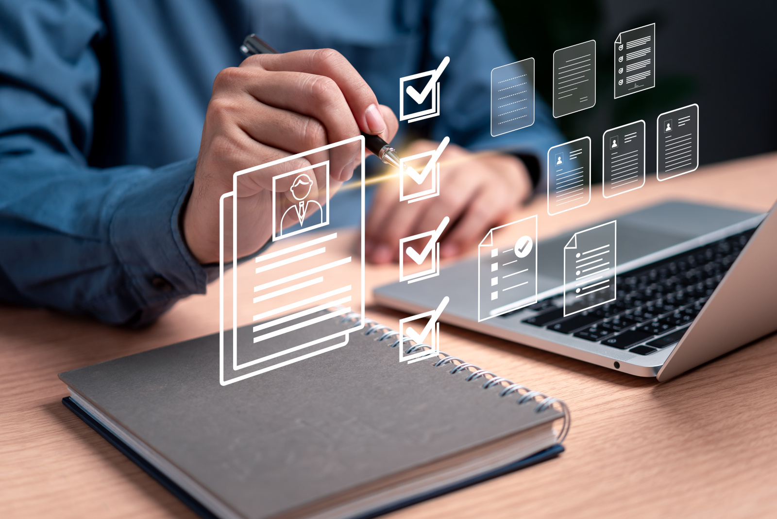 Concept image with virtual icons: Person sat at laptop completing a NestForms survey with pre-populated data