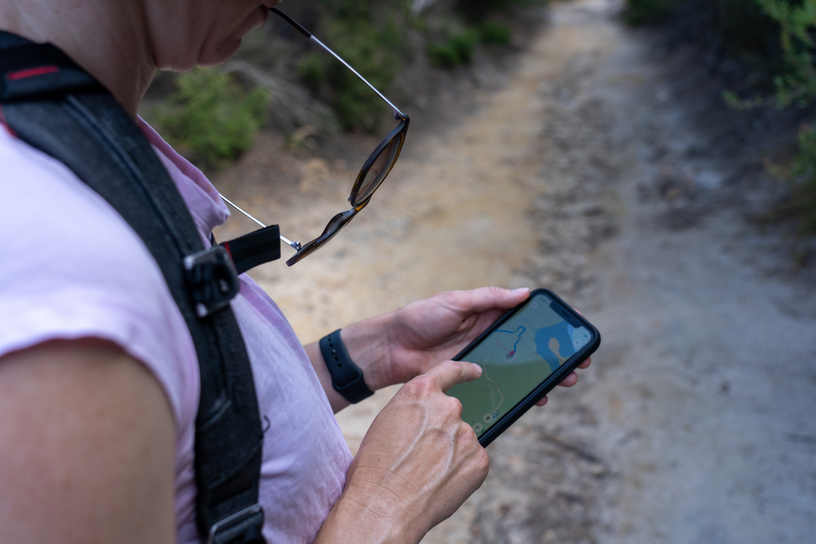 Agriculturalist carrying out a Land Survey and using GPS map select on smartphone: NestForms Offline Survey