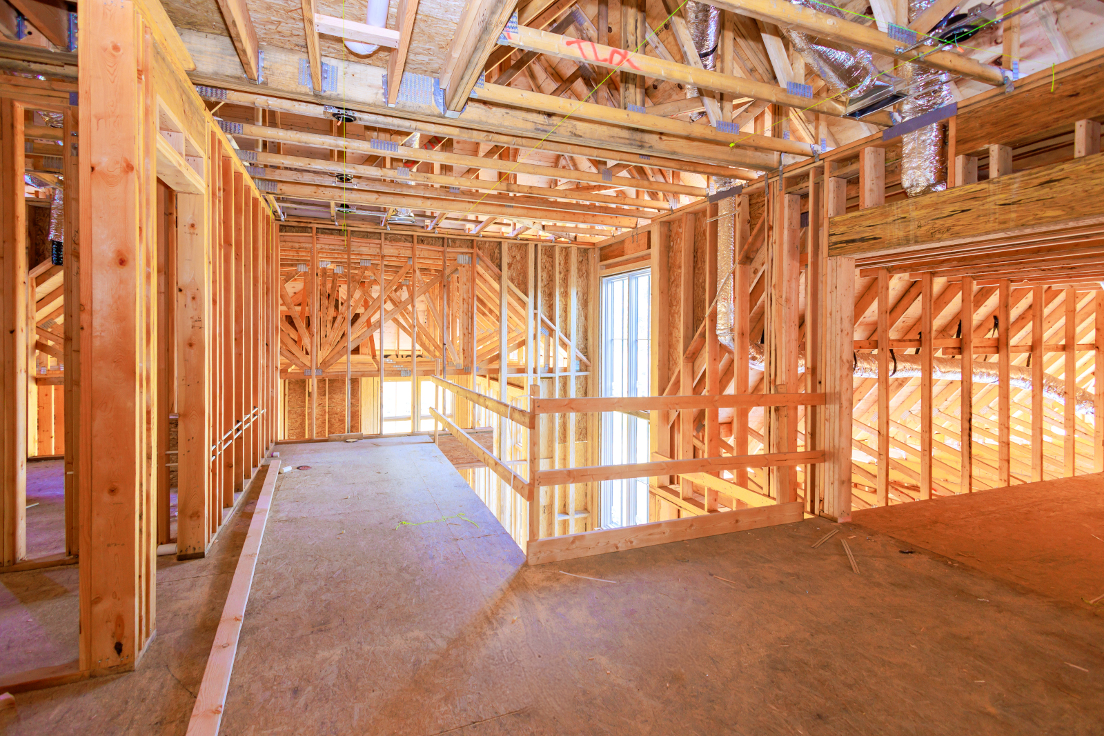 Image of a wooden house interior under construction and ready for an inspection using the NestForms Snag list app